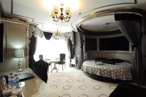 Postel nebo postele na pokoji v ubytování Ottoman's Life Hotel S Class
