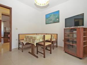 TV a/nebo společenská místnost v ubytování Apartments Luciano 1728