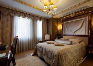 Postel nebo postele na pokoji v ubytování Ottoman's Life Hotel S Class
