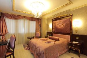 Postel nebo postele na pokoji v ubytování Ottoman's Life Hotel S Class