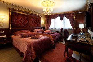 Postel nebo postele na pokoji v ubytování Ottoman's Life Hotel S Class