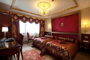 Postel nebo postele na pokoji v ubytování Ottoman's Life Hotel S Class