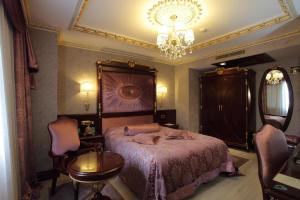 Postel nebo postele na pokoji v ubytování Ottoman's Life Hotel S Class