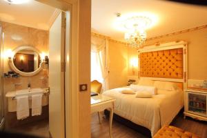 Postel nebo postele na pokoji v ubytování Ottoman's Life Hotel S Class