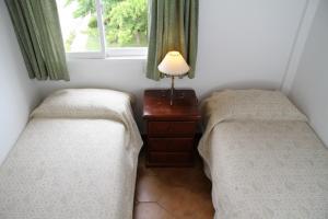 Una cama o camas en una habitación de Amari Suites