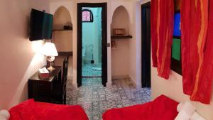 Postel nebo postele na pokoji v ubytování Riad Africa