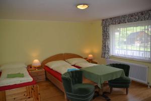 Кровать или кровати в номере Pension Edelweiss Top21