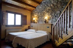 Llit o llits en una habitació de Casa Pubill (Turismo Rural)