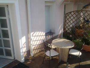 A balcony or terrace at Apartments Villa Palme