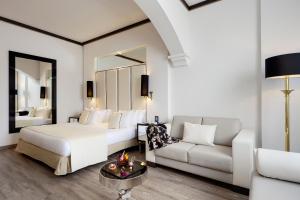 Кровать или кровати в номере Meliá Milano