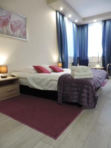 Posteľ alebo postele v izbe v ubytovaní Apartament Blue