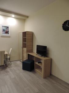 Telewizja i/lub zestaw kina domowego w obiekcie Apartament Blue