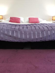 Ένα ή περισσότερα κρεβάτια σε δωμάτιο στο Apartament Blue