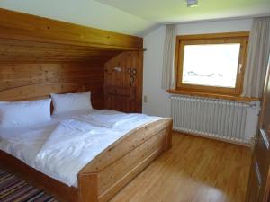 En eller flere senge i et værelse på Ferienhaus in der Sonne