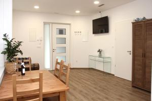 TV a/nebo společenská místnost v ubytování Maja Apartment