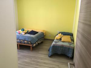 Postel nebo postele na pokoji v ubytování La Terrazza di Gino