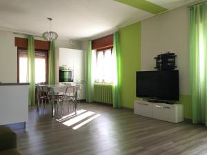 TV a/nebo společenská místnost v ubytování La Terrazza di Gino