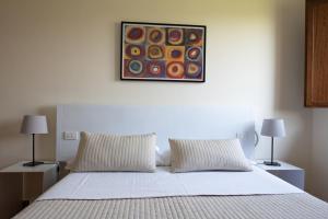 Assisium Agriturismo客房内的一张或多张床位