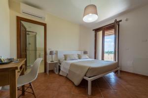 Assisium Agriturismo客房内的一张或多张床位