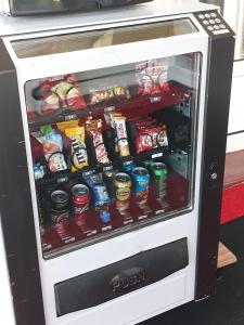 a refrigerator filled with lots of food and drinks at Fasthotel Narbonne in Narbonne