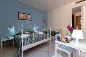 Postel nebo postele na pokoji v ubytování Hotel Achibea