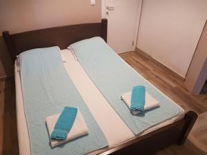 Postelja oz. postelje v sobi nastanitve Apartmani Simić Valjevo
