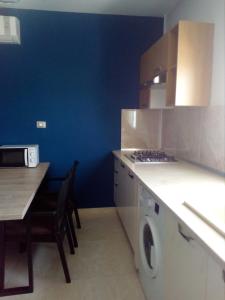 Кухня или мини-кухня в London House
