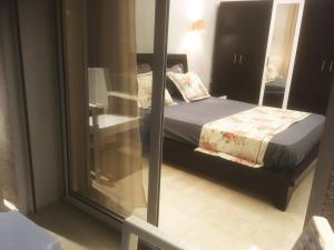Кровать или кровати в номере London House