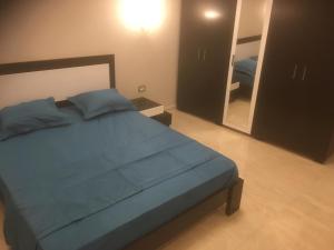 Кровать или кровати в номере London House