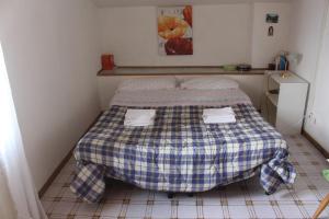 Postelja oz. postelje v sobi nastanitve Appartamento nella campagna romana