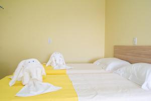 Llit o llits en una habitació de Hospedagem Joanópolis