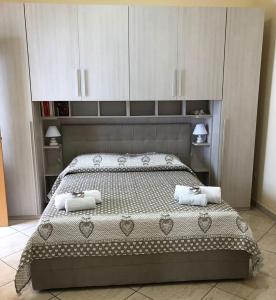 Posteľ alebo postele v izbe v ubytovaní Cuore di Stabia