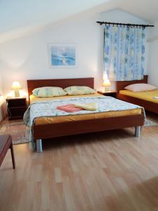 Un ou plusieurs lits dans un hébergement de l'établissement Apartmani Sirovica