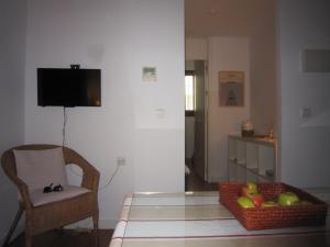 Telewizja i/lub zestaw kina domowego w obiekcie Apartamento céntrico Plaza del Salvador