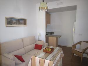 Część wypoczynkowa w obiekcie Apartamento céntrico Plaza del Salvador