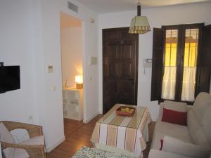 Część wypoczynkowa w obiekcie Apartamento céntrico Plaza del Salvador