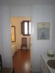 Łóżko lub łóżka w pokoju w obiekcie Apartamento céntrico Plaza del Salvador