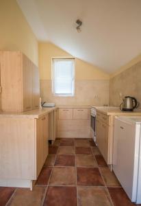 Kuchyň nebo kuchyňský kout v ubytování Apartments Radimir