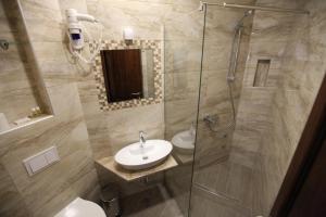 Vannituba majutusasutuses Apis Hotel
