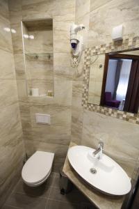 Vannituba majutusasutuses Apis Hotel