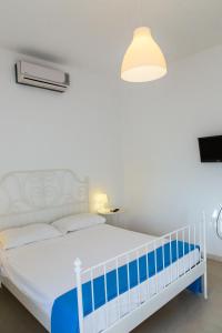 Postel nebo postele na pokoji v ubytování Jazira