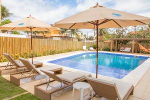 Bazén v ubytování Wave Suítes Hotel & Lounge bar nebo v jeho okolí