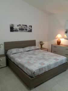 Ένα ή περισσότερα κρεβάτια σε δωμάτιο στο Casa Eleonora