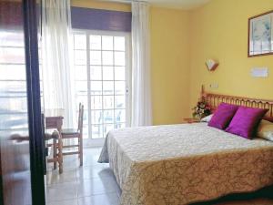 Tempat tidur dalam kamar di Hotel Bonaire