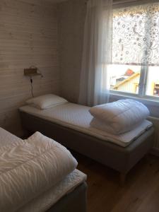 Postel nebo postele na pokoji v ubytování Mittes Rum