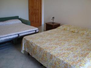 Posteľ alebo postele v izbe v ubytovaní Villa Leonardo