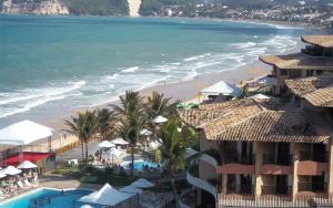 an aerial view of a beach with a resort at Atlántico Flat in Natal
