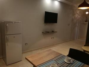 Телевизор и/или развлекательный центр в London House