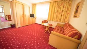 TV/Unterhaltungsangebot in der Unterkunft Superior Hotel Persal