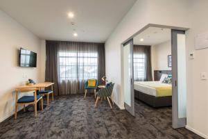 Postel nebo postele na pokoji v ubytování Quest on Manchester Serviced Apartments + 37 fotografií